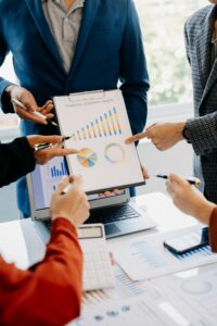 business-team-meeting-present sales performance agency measuring marketing roi 